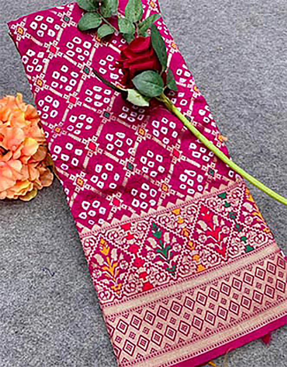 Dark Pink Bandhani Silk Saree With Zari Weaving Work