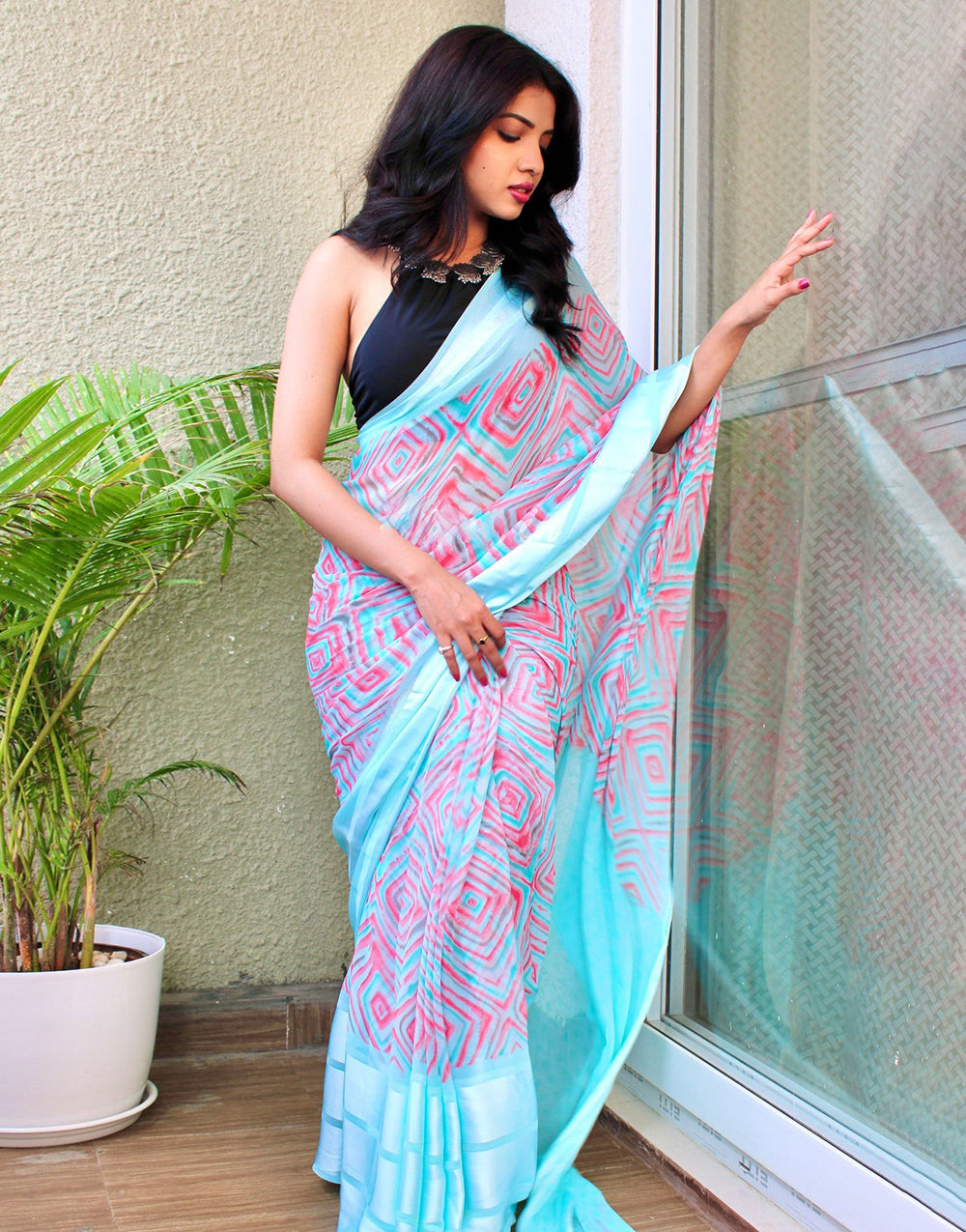 Sky Blue Georgette Printed Saree With Satin Patta