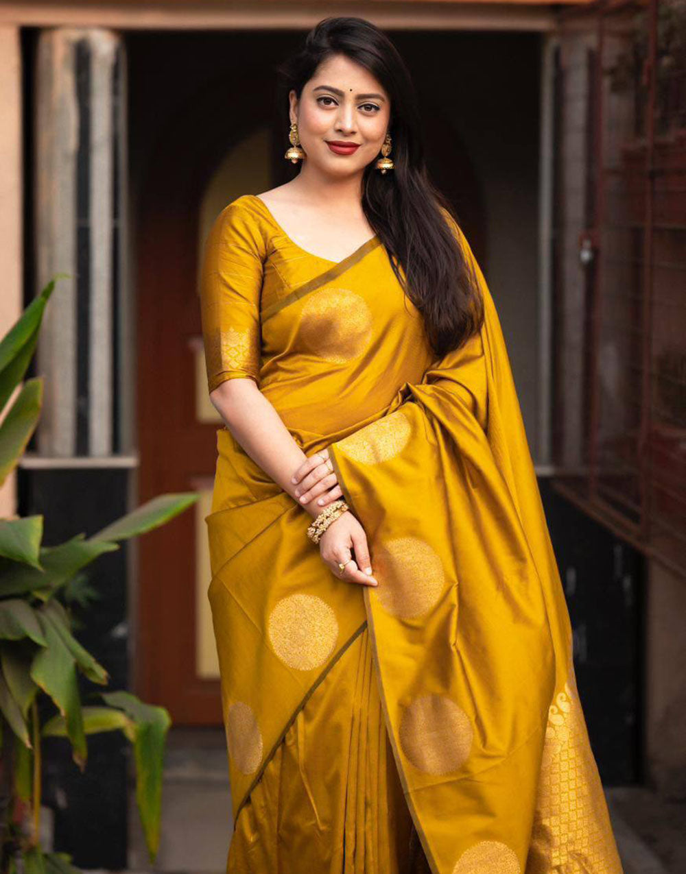 Bright Yellow Silk Saree With Zari Weaving Work