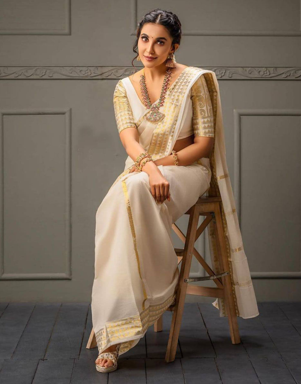 White Soft Banarasi Silk Saree With Gold Zari Weaving Work