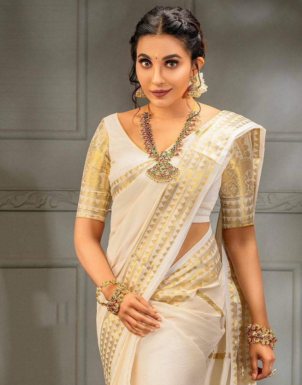 White Soft Banarasi Silk Saree With Gold Zari Weaving Work