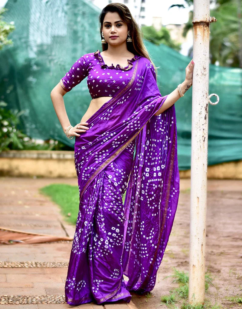 Purple color soft bandhani silk saree with hand bandhej work