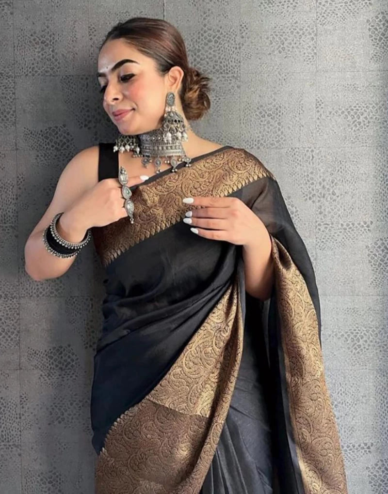 Flaunt Black Soft Silk Saree With Zari Weaving Work