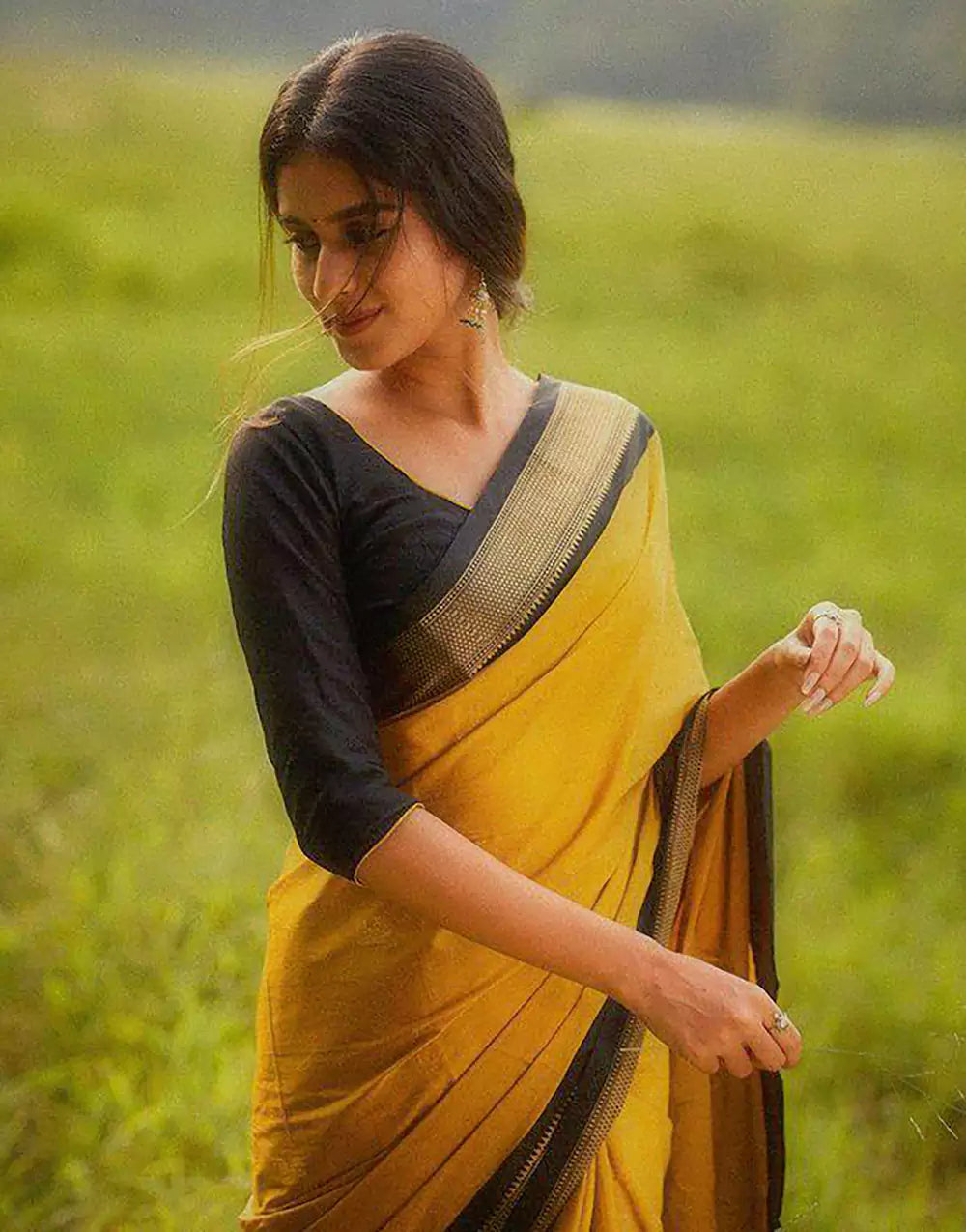 Yellow And Black Banarasi Soft Silk Zari Weaving Saree