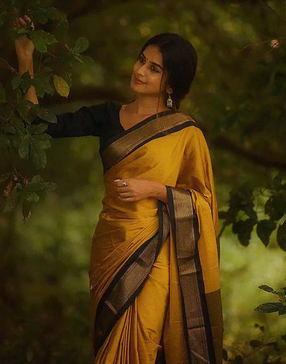 Yellow And Black Banarasi Soft Silk Zari Weaving Saree