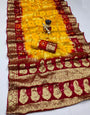Yellow And Maroon hand bandhej silk saree with zari weaving work