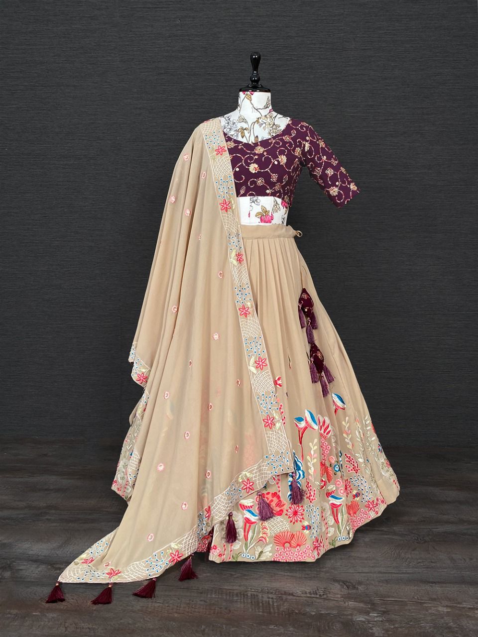 Georgette Chickoo Coloured Sequins and Thread Embroidered Lehenga Choli